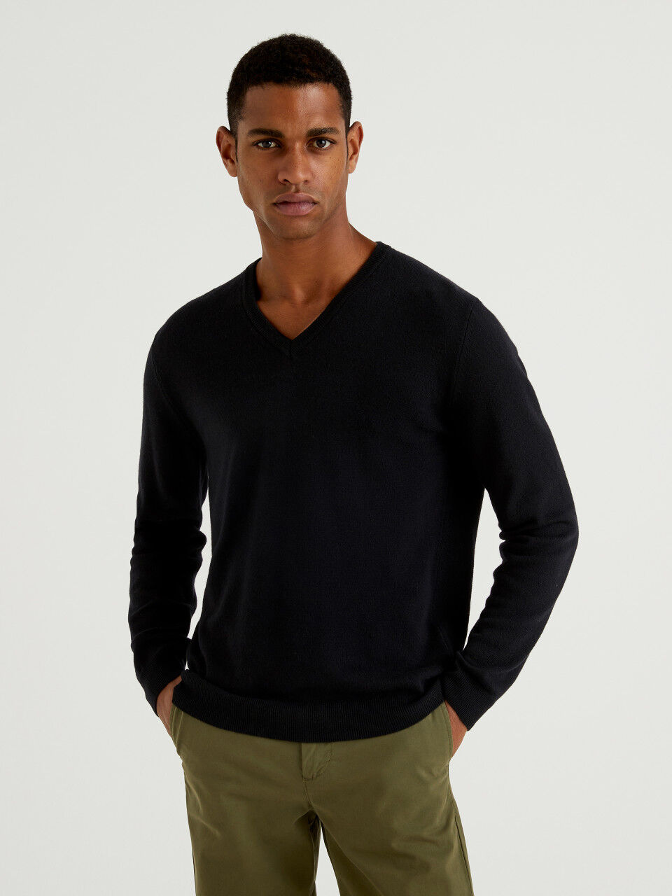 Black V-neck sweater in pure Merino wool