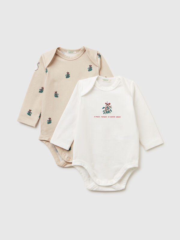 Two long sleeve ribbed knit onesies New Born (0-18 months)