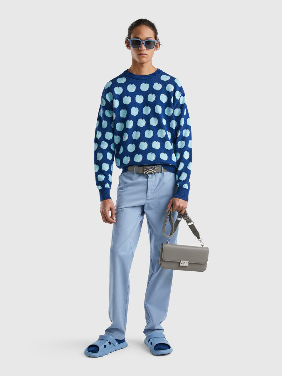 Blue sweater with apple pattern