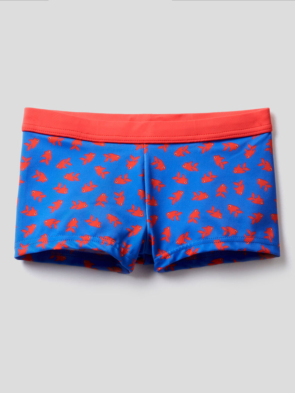 Fish patterned swim trunks image number 1
