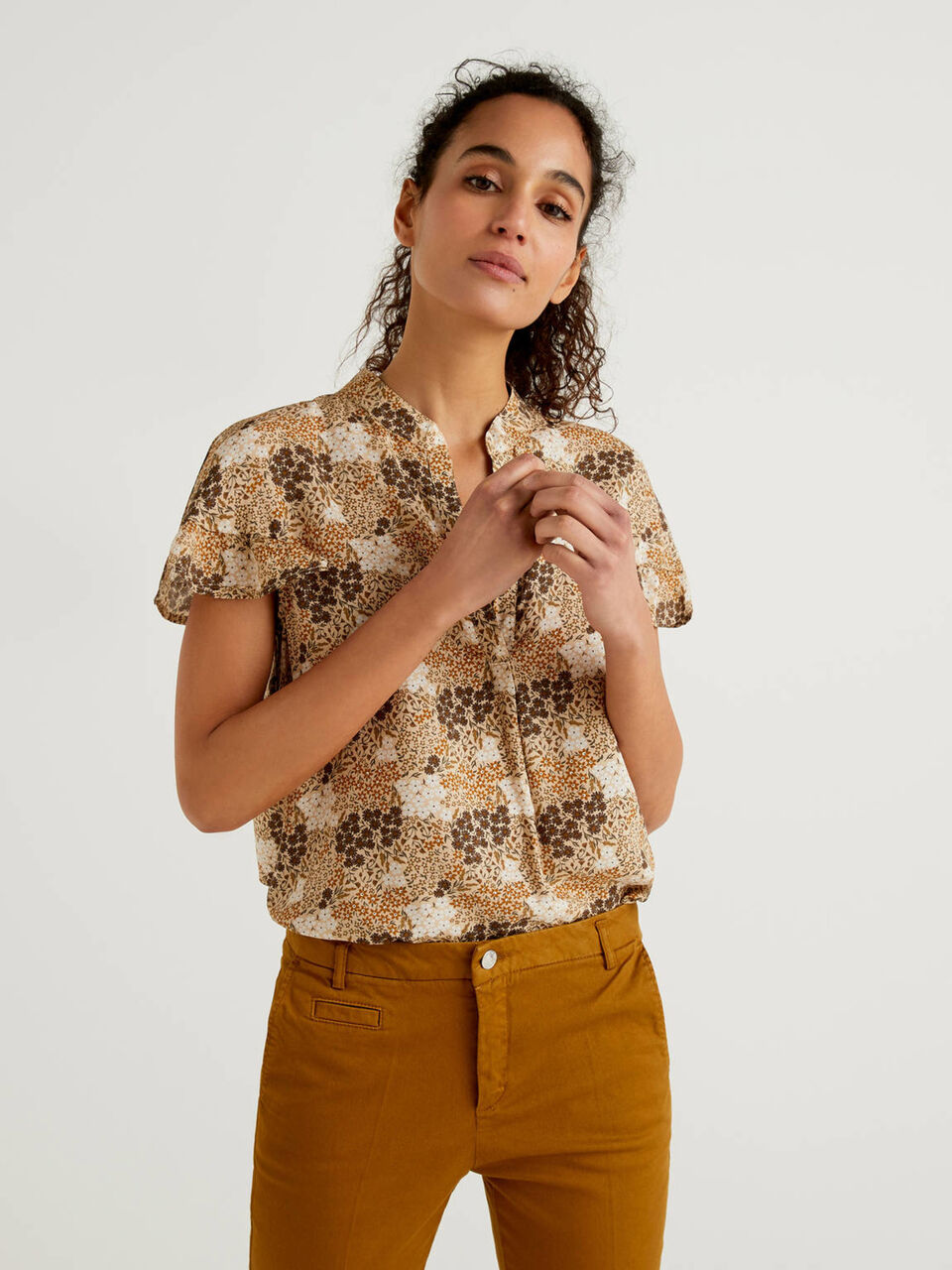 Patterned blouse with rouches