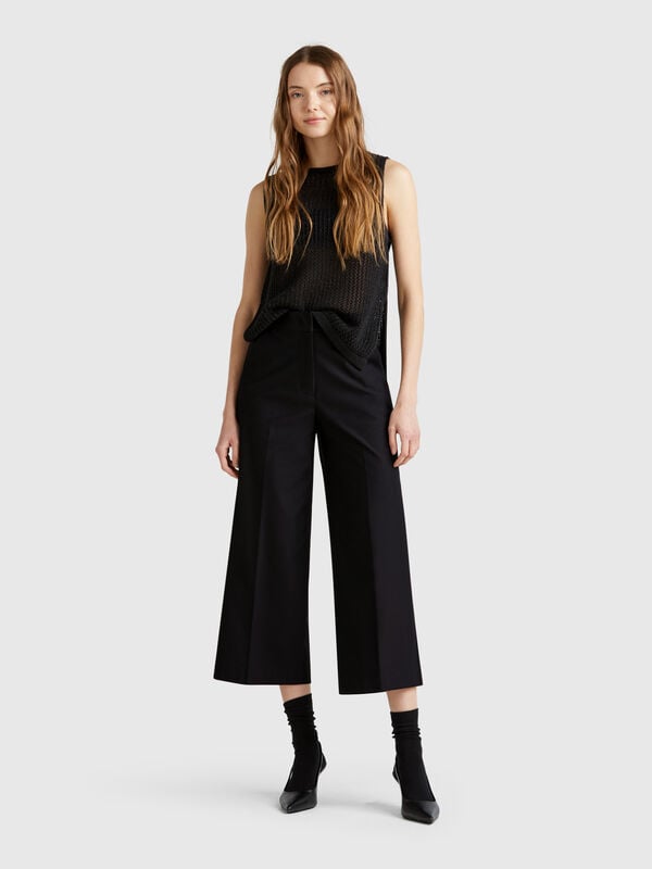 Cropped high-waisted trousers Women