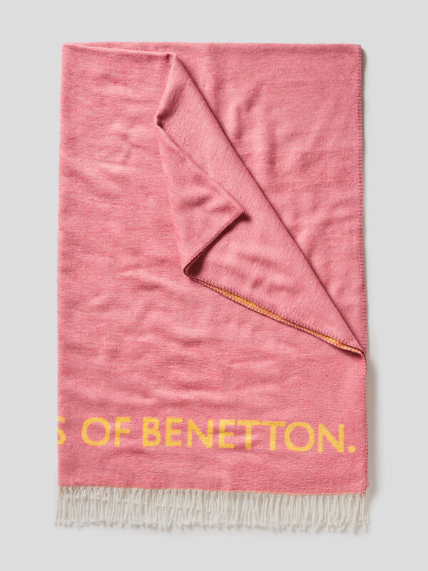 Frayed blanket with logo