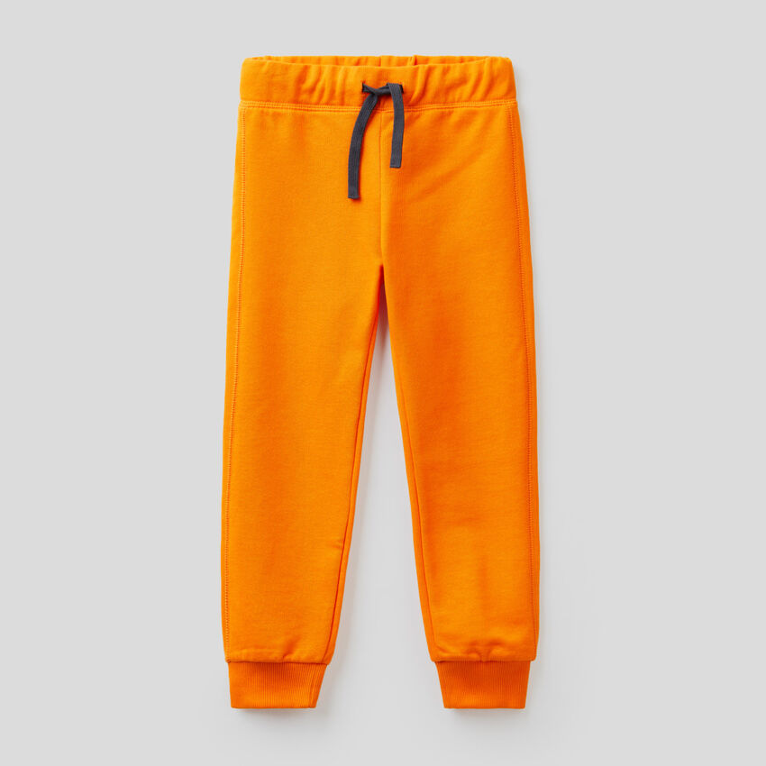 Orange sweatpants in 100% cotton