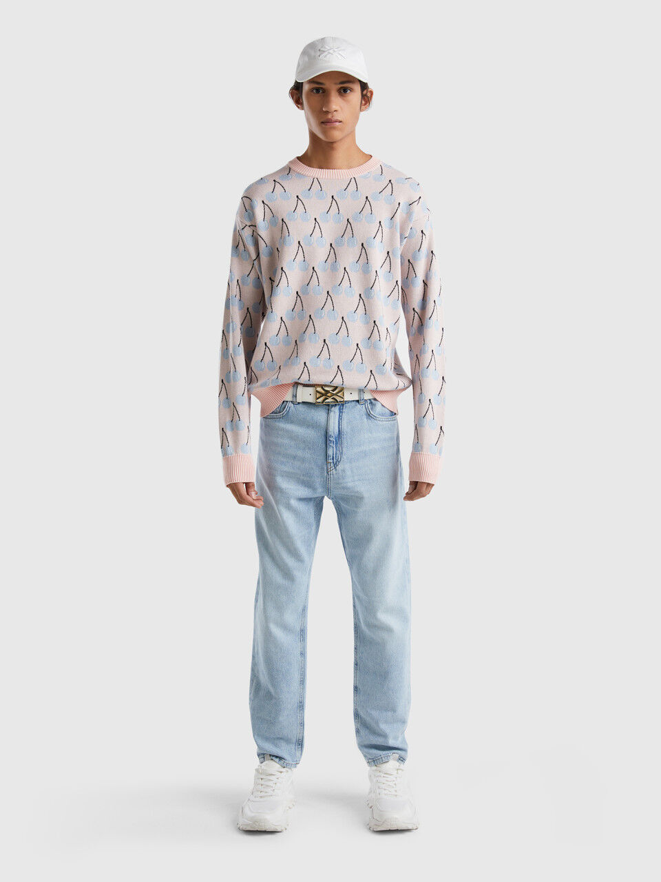 Pink sweater with cherry pattern