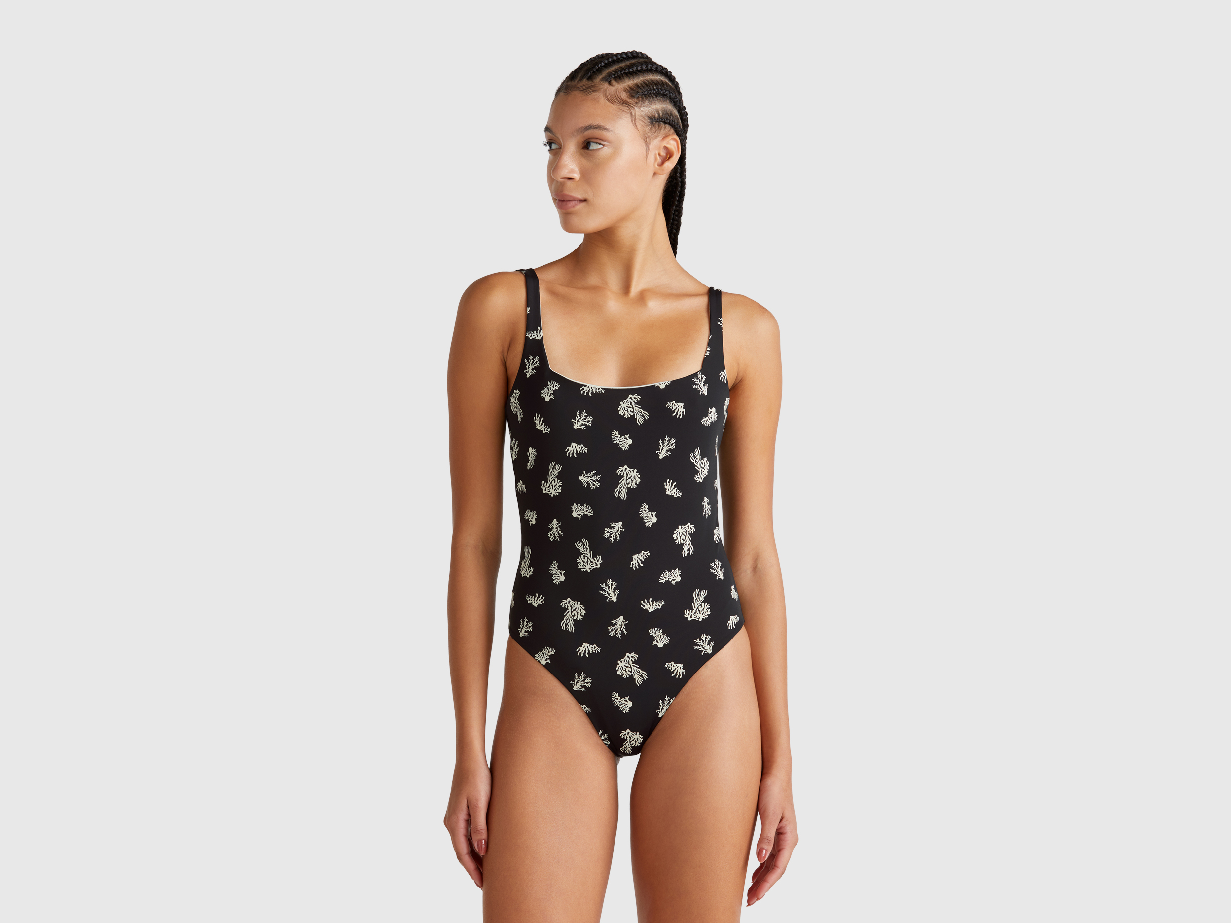 One-piece swimsuit with coral print - Black | Benetton